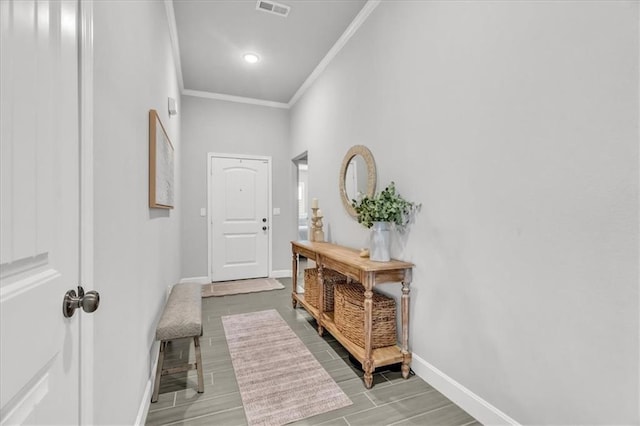21404 W 47th Ter, Shawnee, KS 66218 - doorway to outside featuring ornamental molding and wood tiled floors
