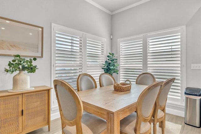 21404 W 47th Ter, Shawnee, KS 66218 - dining area featuring plenty of natural light, ornamental molding, light wood-type flooring, and recessed lighting