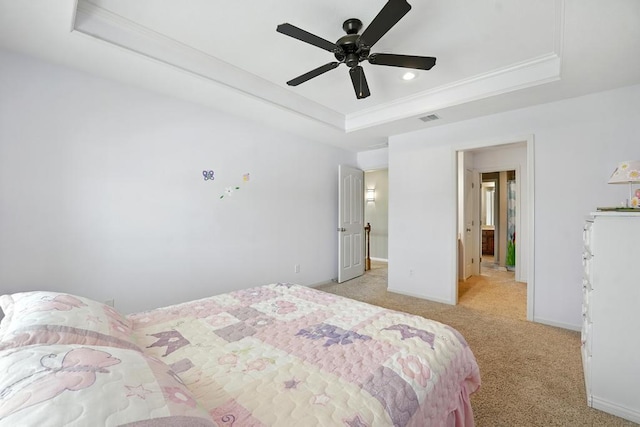 2312 NE Sweet Water Dr, Lees Summit, MO 64086 - bedroom with a tray ceiling, light carpet, crown molding, and ceiling fan