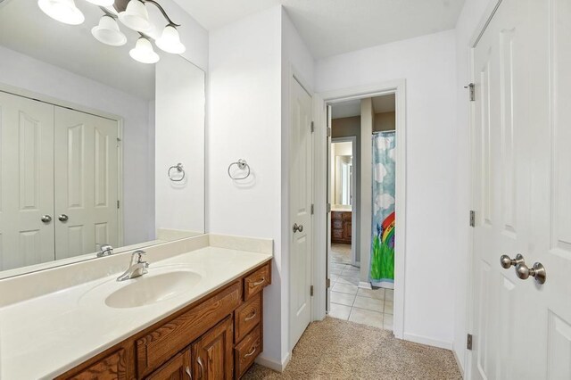 2312 NE Sweet Water Dr, Lees Summit, MO 64086 - bathroom with vanity and baseboards