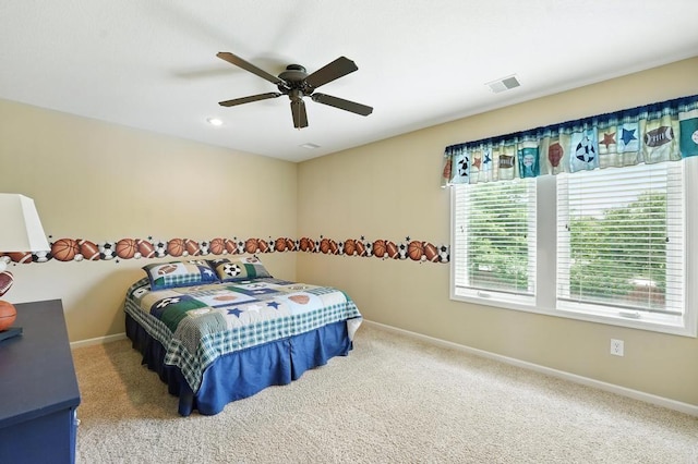 2312 NE Sweet Water Dr, Lees Summit, MO 64086 - carpeted bedroom with baseboards and a ceiling fan