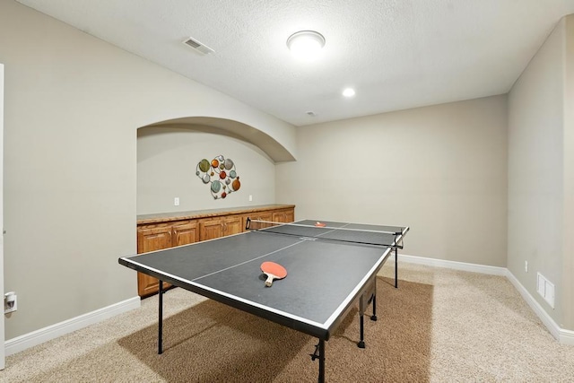 2312 NE Sweet Water Dr, Lees Summit, MO 64086 - game room featuring light colored carpet and a textured ceiling