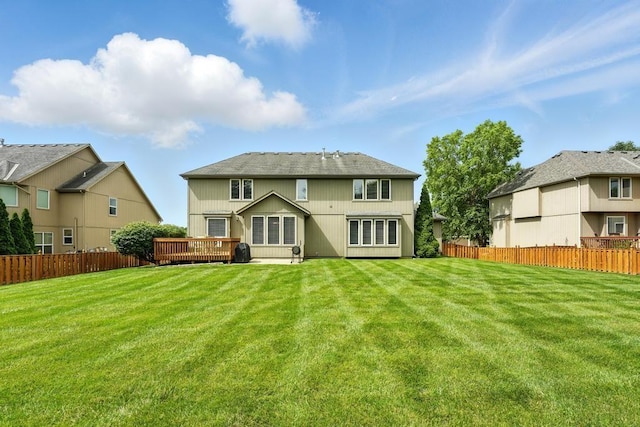 2312 NE Sweet Water Dr, Lees Summit, MO 64086 - rear view of house featuring a wooden deck