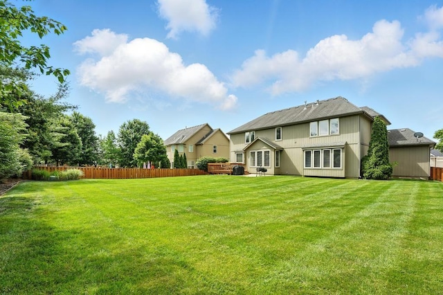 2312 NE Sweet Water Dr, Lees Summit, MO 64086 - rear view of property with a patio area