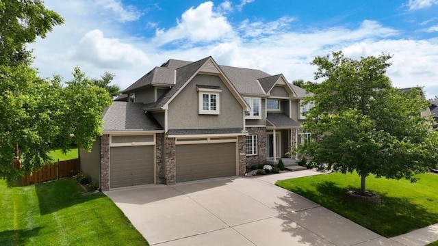 2312 NE Sweet Water Dr, Lees Summit, MO 64086 - craftsman house featuring stucco siding, concrete driveway, a garage, a shingled roof, and stone siding