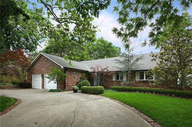 490 W 49th Ter, Kansas City, MO 64112 - ranch-style house featuring brick siding, a garage, concrete driveway, a front lawn, and a shingled roof