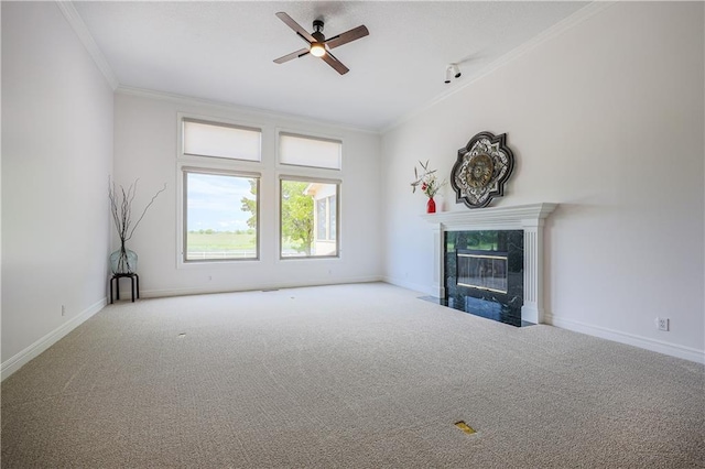 26528-23.09 S Metcalf Rd, Louisburg, KS 66053 - unfurnished living room with carpet, crown molding, a tile fireplace, and ceiling fan