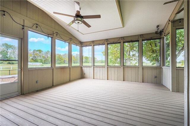 26528-23.09 S Metcalf Rd, Louisburg, KS 66053 - unfurnished sunroom with a ceiling fan and vaulted ceiling