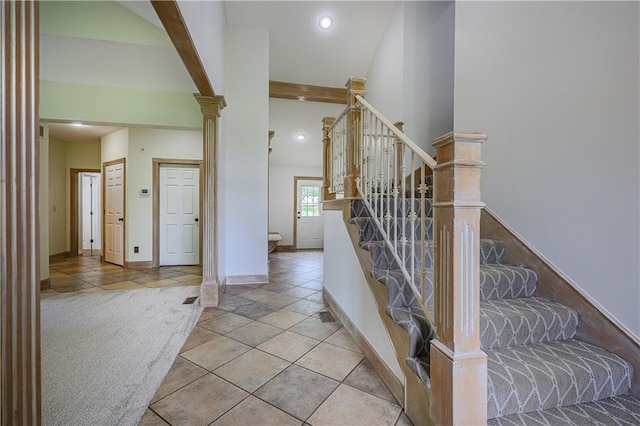 26528-23.09 S Metcalf Rd, Louisburg, KS 66053 - stairs with beam ceiling, recessed lighting, and ornate columns