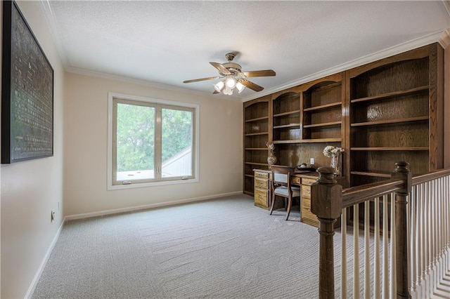 26528-23.09 S Metcalf Rd, Louisburg, KS 66053 - office area with crown molding, carpet floors, a textured ceiling, and a ceiling fan