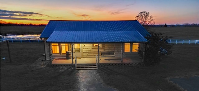 26528-23.09 S Metcalf Rd, Louisburg, KS 66053 - view of front of house with a metal roof