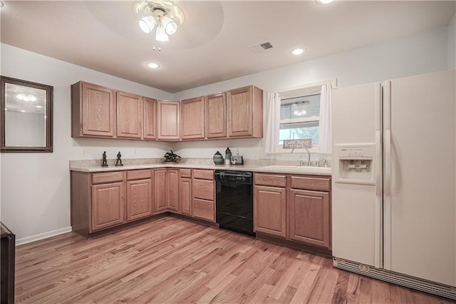 26528-23.09 S Metcalf Rd, Louisburg, KS 66053 - kitchen featuring white refrigerator with ice dispenser, black dishwasher, light wood finished floors, light countertops, and a ceiling fan