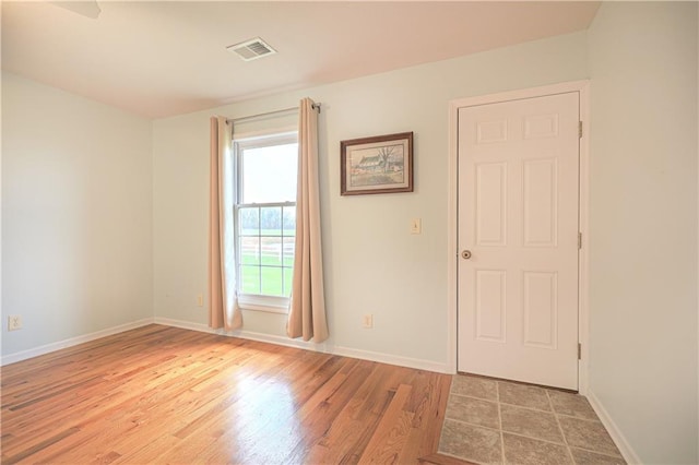26528-23.09 S Metcalf Rd, Louisburg, KS 66053 - spare room with light wood-style floors and baseboards