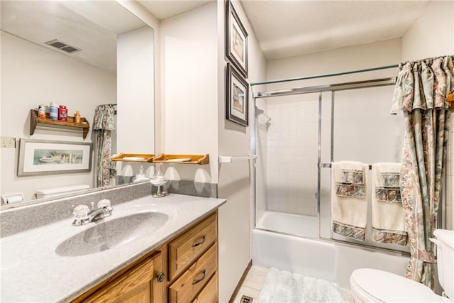 10902 W 96th Ter, Overland Park, KS 66214 - full bath with vanity, shower / bath combination with glass door, and tile patterned flooring