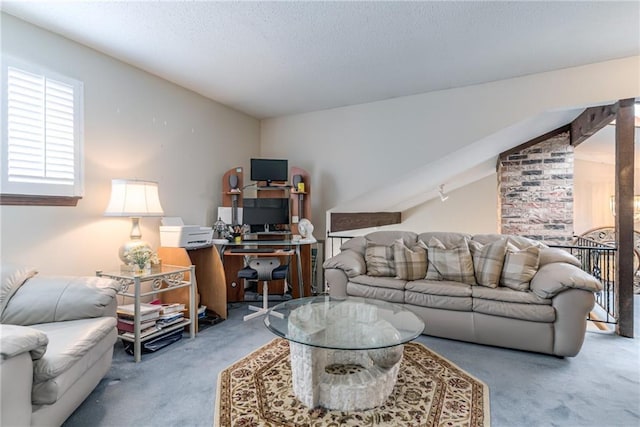 10902 W 96th Ter, Overland Park, KS 66214 - carpeted living area with an office area and a textured ceiling