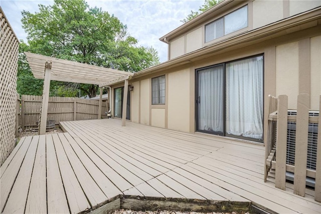 10902 W 96th Ter, Overland Park, KS 66214 - wooden deck with a pergola and a fenced backyard