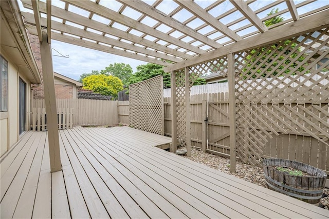 10902 W 96th Ter, Overland Park, KS 66214 - wooden terrace featuring a fenced backyard, a pergola, and a gate