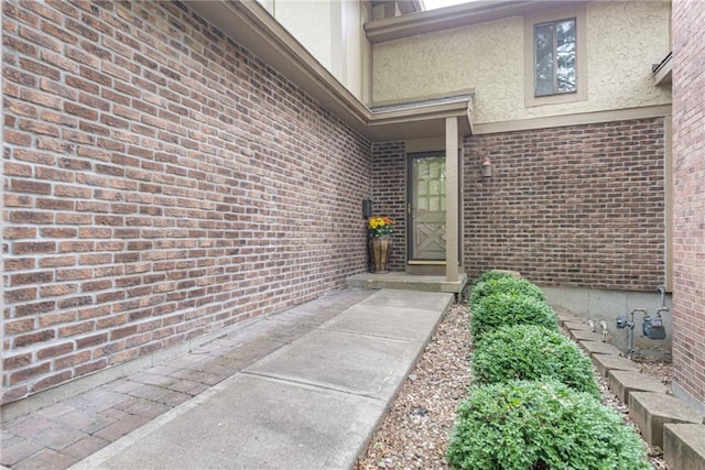 10902 W 96th Ter, Overland Park, KS 66214 - entrance to property featuring stucco siding and brick siding