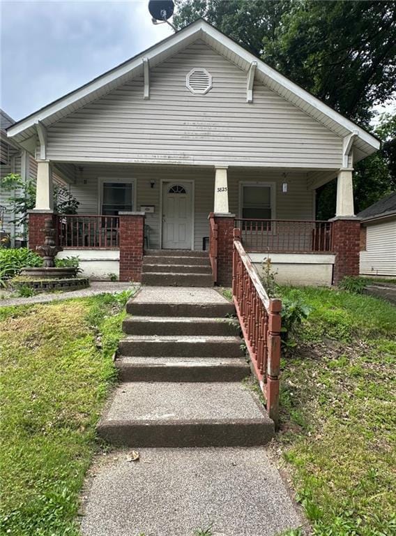 3823 Ruby Ave, Kansas City, KS 66106 - bungalow featuring a porch