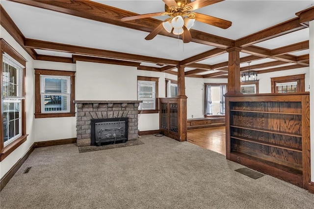 305 E Main St, Richmond, MO 64085 - unfurnished living room featuring a stone fireplace, carpet flooring, coffered ceiling, beamed ceiling, and ceiling fan