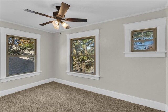 305 E Main St, Richmond, MO 64085 - carpeted empty room featuring crown molding and ceiling fan