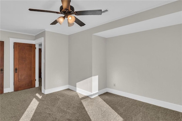 305 E Main St, Richmond, MO 64085 - carpeted spare room featuring a ceiling fan and crown molding