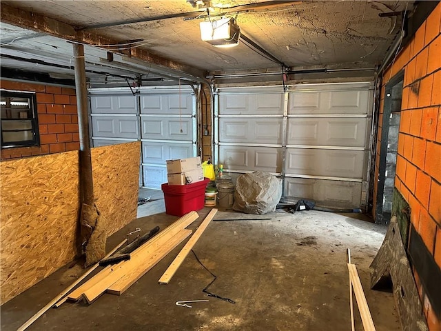 305 E Main St, Richmond, MO 64085 - garage with a garage door opener