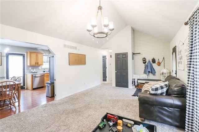 580 SE 110th St, Warrensburg, MO 64093 - living area featuring a chandelier and high vaulted ceiling