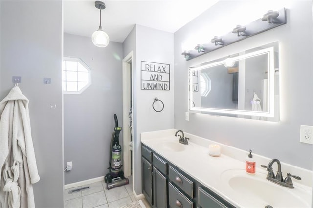 580 SE 110th St, Warrensburg, MO 64093 - bathroom with double vanity and tile patterned flooring