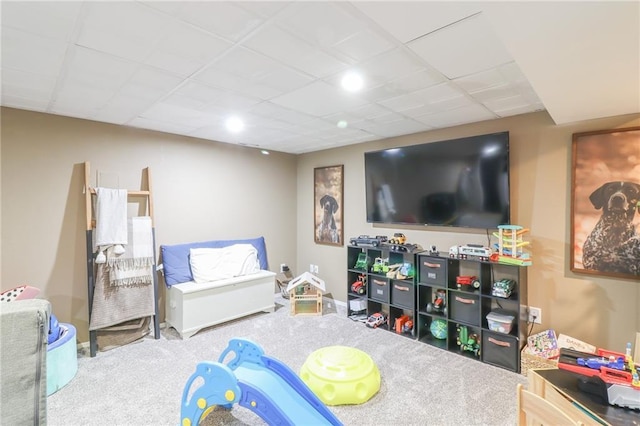 580 SE 110th St, Warrensburg, MO 64093 - recreation room with carpet flooring and a drop ceiling