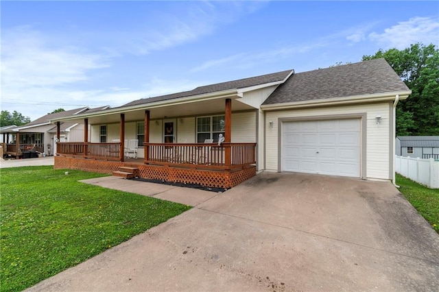606 S Thornton St, Richmond, MO 64085 - single story home featuring a porch, a front yard, a garage, driveway, and roof with shingles