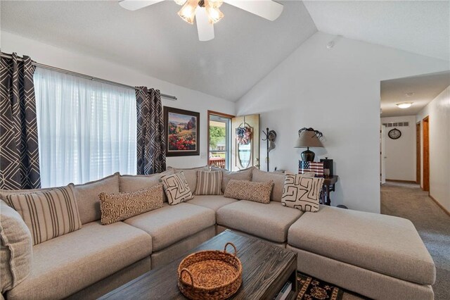606 S Thornton St, Richmond, MO 64085 - living area with ceiling fan, carpet flooring, and high vaulted ceiling