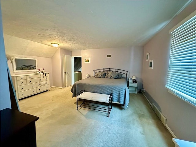 8708 W 92nd St, Overland Park, KS 66212 - bedroom with carpet flooring, multiple windows, and a textured ceiling
