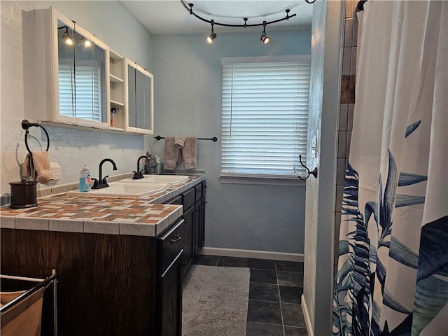 8708 W 92nd St, Overland Park, KS 66212 - bathroom featuring vanity, tile patterned floors, track lighting, and a shower with shower curtain