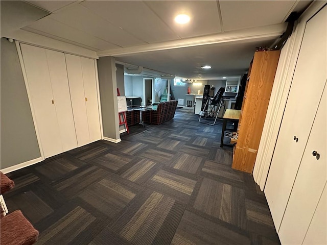 8708 W 92nd St, Overland Park, KS 66212 - finished basement with carpet flooring and a desk