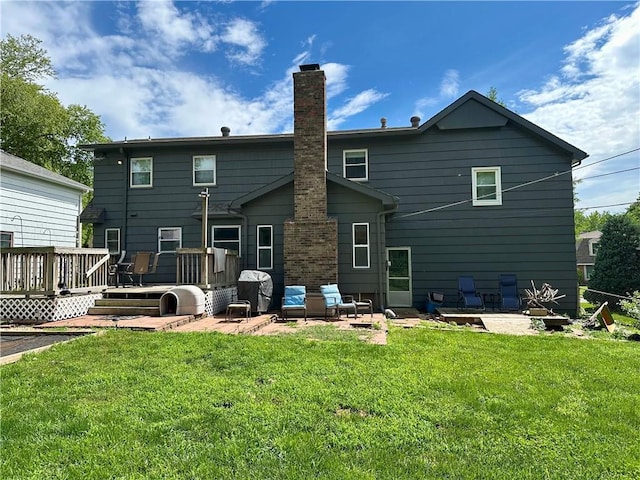 8708 W 92nd St, Overland Park, KS 66212 - rear view of property with a patio, a chimney, a deck, and a lawn