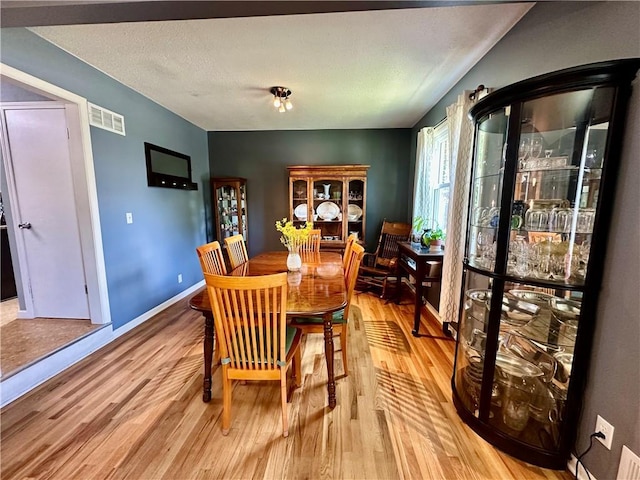 8708 W 92nd St, Overland Park, KS 66212 - dining area featuring light wood-type flooring and baseboards