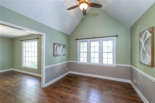 6919 Albervan St, Shawnee, KS 66216 - unfurnished room featuring a ceiling fan, hardwood / wood-style floors, and lofted ceiling
