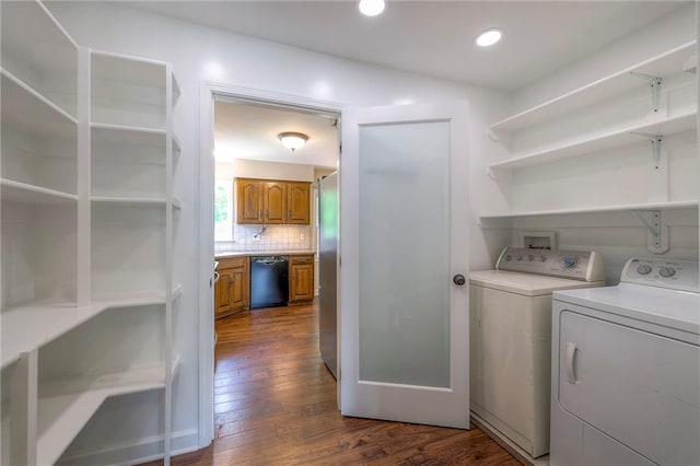 6919 Albervan St, Shawnee, KS 66216 - washroom featuring washing machine and clothes dryer, dark wood-style flooring, and recessed lighting