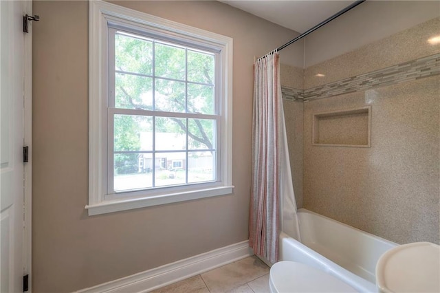 6919 Albervan St, Shawnee, KS 66216 - full bathroom with tile patterned flooring and shower / tub combo