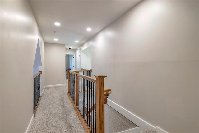 6919 Albervan St, Shawnee, KS 66216 - corridor featuring an upstairs landing, recessed lighting, and light colored carpet