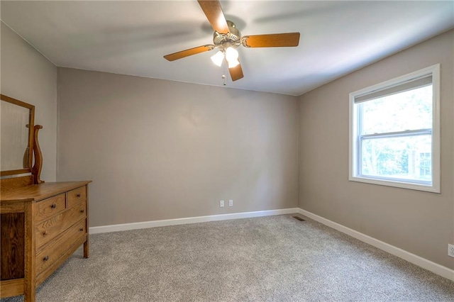 6919 Albervan St, Shawnee, KS 66216 - spare room with light colored carpet and ceiling fan