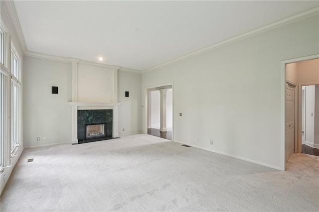 12909 Maple St, Overland Park, KS 66209 - unfurnished living room with carpet, crown molding, and a high end fireplace