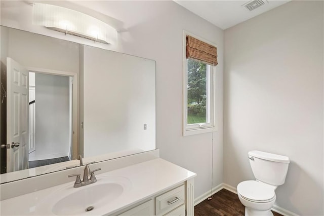 12909 Maple St, Overland Park, KS 66209 - bathroom with vanity and wood finished floors