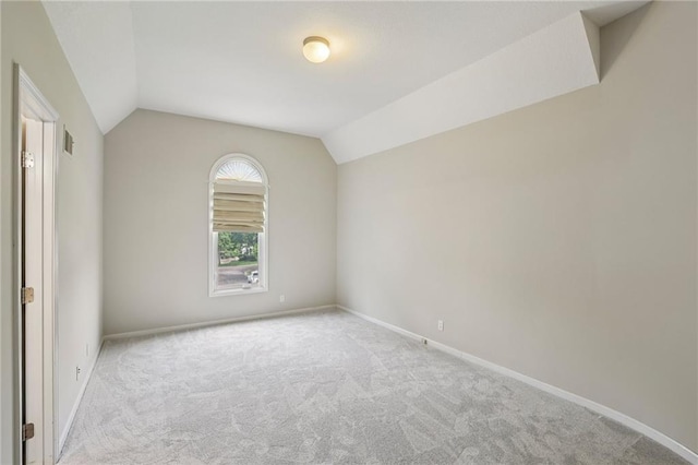 12909 Maple St, Overland Park, KS 66209 - unfurnished room with lofted ceiling and carpet floors