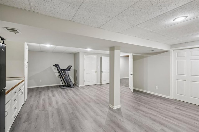 12909 Maple St, Overland Park, KS 66209 - finished basement featuring a drop ceiling and light wood-style floors
