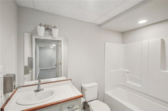 12909 Maple St, Overland Park, KS 66209 - bathroom featuring a paneled ceiling, vanity, bathing tub / shower combination, and recessed lighting