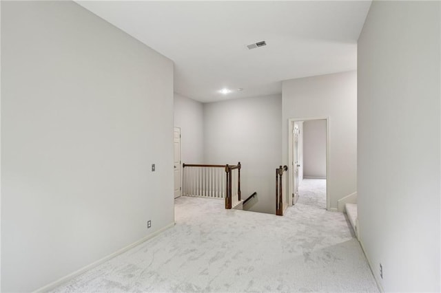 12909 Maple St, Overland Park, KS 66209 - corridor featuring an upstairs landing and carpet floors