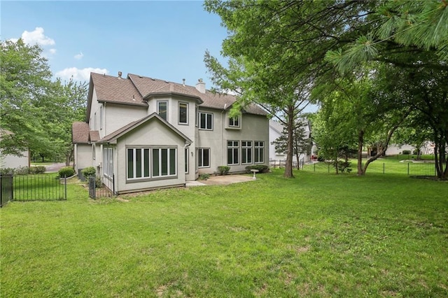 12909 Maple St, Overland Park, KS 66209 - rear view of house with stucco siding, a fenced backyard, a patio, a chimney, and roof with shingles