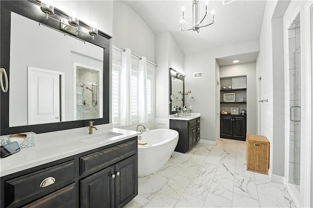 27181 W 100th Ter, Olathe, KS 66061 - bathroom with marble finish floors, a shower stall, two vanities, and recessed lighting